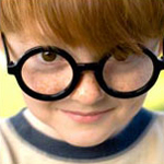 boy wearing harry potter glasses