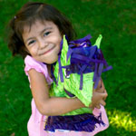 girl holding pinata