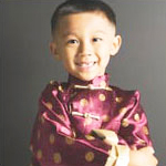 young boy in Chinese costume