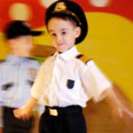 little boy in a theater performance