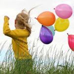 Girl Running with Balloons