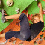 boy at rock climbing gym
