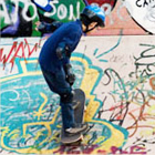 boy skateboarding in a skateboard park