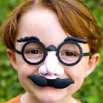 Boy wearing funny glasses