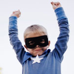 boy dressed in super hero costume