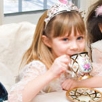 girl drinking tea at tea party